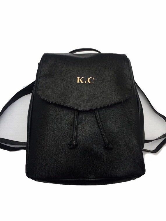 leather look backpack women's