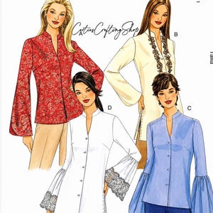 May include: McCall's sewing pattern 4148 featuring four blouse designs. The blouses have various sleeve styles, including bell sleeves and lace trim. The pattern includes sizes BB (8-10-12-14).