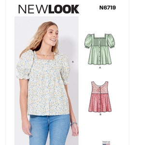May include: A woman wearing a floral print top with a square neckline and short, puffed sleeves. The top is paired with blue jeans. The image also shows a sewing pattern with illustrations of two different top designs, one in green gingham and another in pink floral.