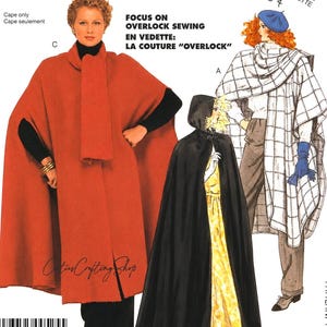 May include: McCall's 2666 sewing pattern envelope featuring illustrations of three cape styles. One is a solid rust-colored cape, another is a black hooded cape, and the third is a white cape with a black grid pattern. Text includes Easy McCall's 2666.