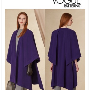 May include: Vogue Patterns V1818. A woman models a purple cape with angled sleeves. The pattern includes the text "VOGUE PATTERNS" and "TOM AND LINDA PLATT". The cape is designed and printed in the USA.
