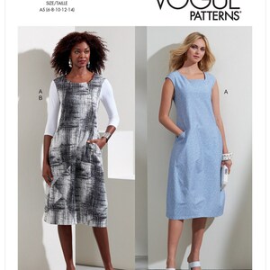 May include: Vogue Patterns V1860 sewing pattern showing two knee-length dresses. One dress is a black and white print with white sleeves, the other is a solid light blue dress. The pattern is designed by Marcy Tilton.