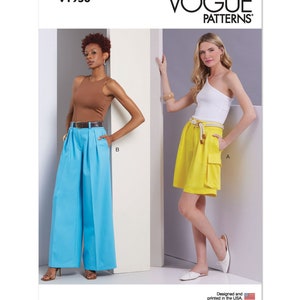 May include: Vogue Patterns V1958 sewing pattern envelope featuring two garment views. View B shows bright blue wide-leg trousers with a brown belt. View A shows yellow knee-length shorts with a cargo pocket and a rope belt. Text includes V1958, VOGUE PATTERNS, and Designed and printed in the USA.