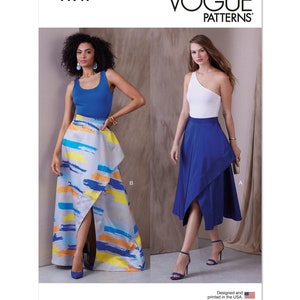 May include: Vogue Patterns V1941 sewing pattern envelope featuring two skirt variations. View B is a floor-length skirt with a blue, yellow, and orange brushstroke print. View A is a solid blue midi-length skirt with an asymmetrical wrap-style front.