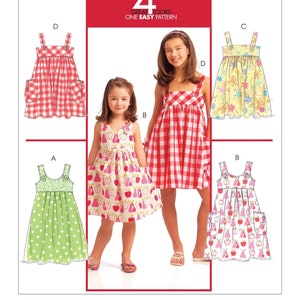 May include: McCall's pattern featuring four different girls' dress designs. The dresses include a red and white gingham dress, a green polka dot dress, a yellow floral dress, and a white dress with a fruit pattern. The pattern is labeled "4 Great Looks One Easy Pattern."