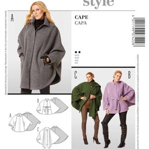 May include: Burda Style sewing pattern 7422 for a cape. The envelope displays three variations: a grey collared cape, a green cape with a button closure, and a lavender cape with a belted waist. Includes EUR sizes 36-50 and US sizes 10-24.