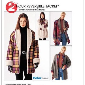 May include: McCall's 2 Hour Reversible Jacket sewing pattern envelope featuring illustrations of a reversible jacket with a plaid side and a solid fleece side. The text includes McCall's, 2 Hour Reversible Jacket, and Polar Gear branding.