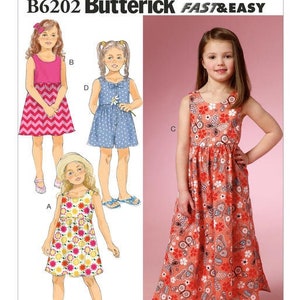 May include: A sewing pattern for girls' dresses, featuring four different styles. The pattern is called "B6202 Butterick FAST & EASY".