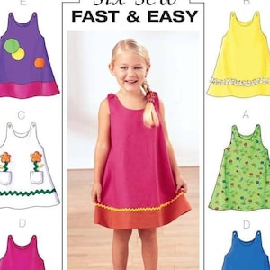May include: A sewing pattern for six sleeveless dresses for girls. The pattern is called "Six Sew Fast & Easy" and is from Butterick. The dresses are shown in different colors and patterns, including purple, yellow, white, pink, blue, and green.