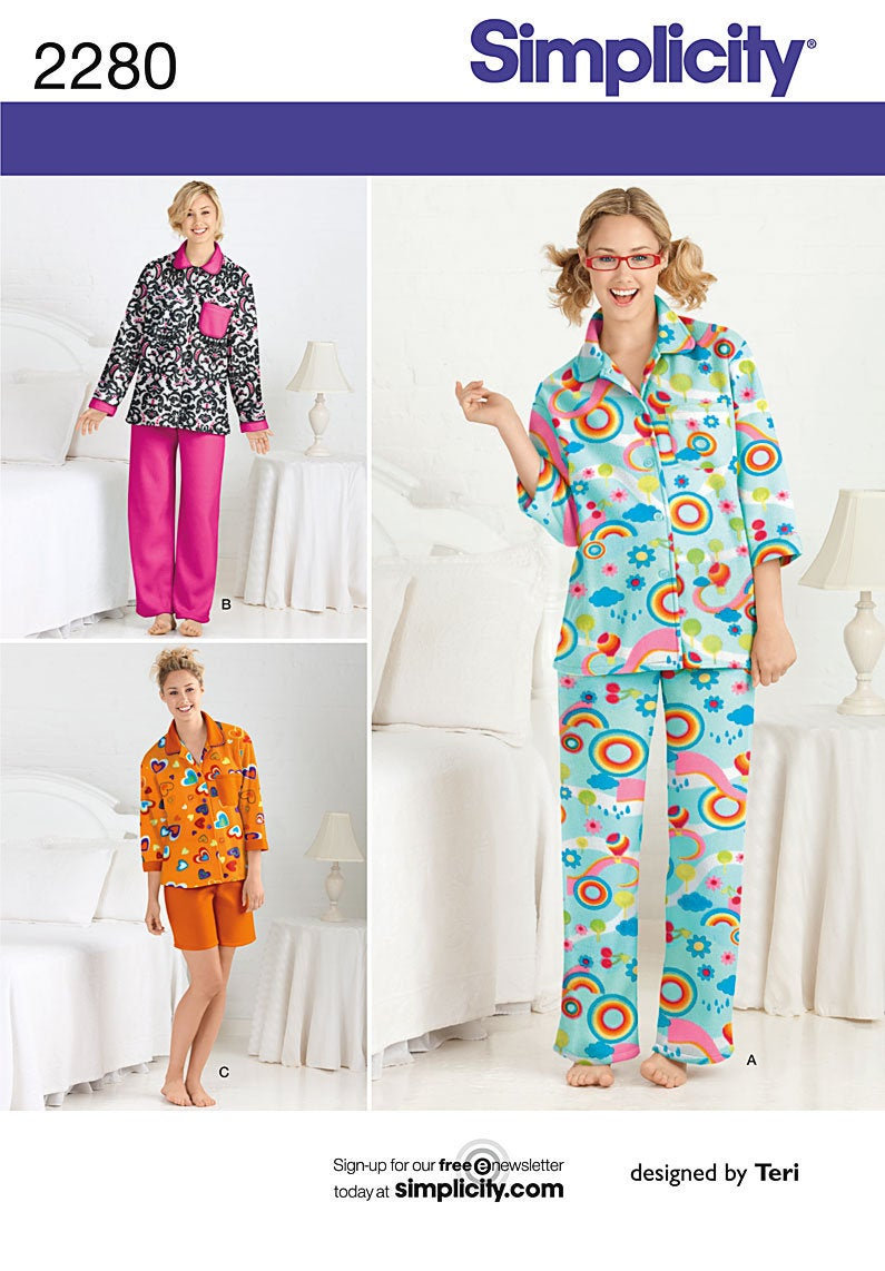 Puede incluir: Patrón Simplicity 2280 con conjuntos de pijama. Los conjuntos incluyen una variedad de diseños coloridos, incluyendo un estampado floral en blanco y negro, un patrón de arcoíris y nubes, y un diseño de corazón naranja. El patrón incluye una parte superior de manga larga y pantalones cortos.