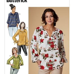 May include: A sewing pattern for a women's blouse with a V-neck and long sleeves. The pattern includes four different styles: a plaid blouse, a yellow blouse with polka dots, a green blouse, and a floral blouse. The pattern is labeled "B6632 Butterick".