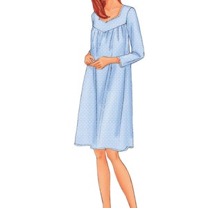May include: A light blue nightgown with white polka dots and a lace trim around the neckline. The nightgown has long sleeves with lace trim at the cuffs.