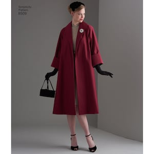 May include: A woman wearing a long, red coat with a wide collar and a brooch. She is also wearing black gloves and heels.