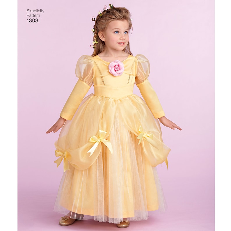 May include: A yellow princess costume with a tulle skirt and puff sleeves. The costume has a pink rose on the bodice and yellow bows on the skirt. Simplicity Pattern 1303.