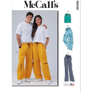 May include: McCall's sewing pattern M8458 for unisex cargo pants. The pattern shows a couple wearing yellow cargo pants with multiple pockets and a drawstring waist. The pattern also includes three different styles of cargo pants: teal, blue, and gray.