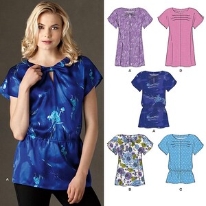 May include: New Look 6009 sewing pattern envelope featuring illustrations of four short-sleeve top variations. Designs include a blue floral print top with a keyhole neckline, a pink top with pintucks, a blue floral top with a drawstring waist, and a blue polka dot top.