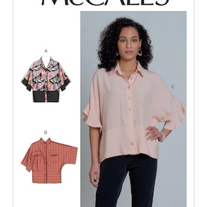 May include: A sewing pattern for a women's blouse with three different sleeve variations. The pattern is called McCall's M8001.