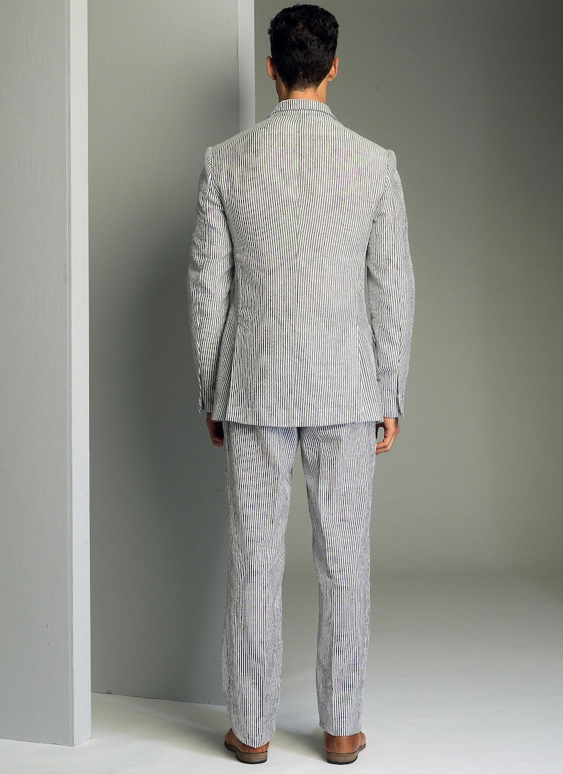 May include: A striped suit in a light blue and white color combination. The suit jacket has a single button closure and the pants have a straight leg.