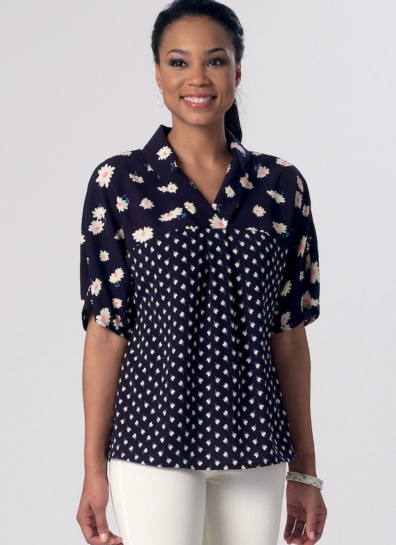 navy and white spotted tops