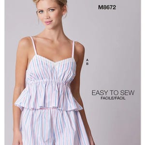 May include: A McCall's M8672 sewing pattern envelope featuring a two-piece pajama set with a camisole top and shorts. The garment has a white base with vertical pink and blue stripes, a ruffled waist, and white lace trim along the neckline.