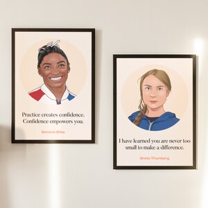 以下が含まれることがあります： シモーヌ・バイルズとグレタ・トゥーンベリのイラストが描かれた額装されたポスター2枚。シモーヌ・バイルズのポスターには「Practice creates confidence. Confidence empowers you.」という引用が書かれている。グレタ・トゥーンベリのポスターには「I have learned you are never too small to make a difference.」という引用が書かれている。