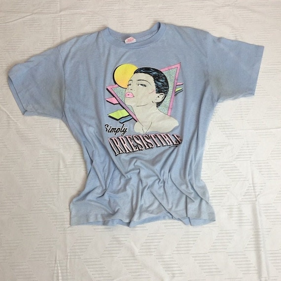 Whatta find! 1989 Simply Irresistible Tee-shirt from the 1989 SUNRISE/Acid Dance Party in the UK Pale Blue Tee Shirt Size XL ( 46 - 48 )