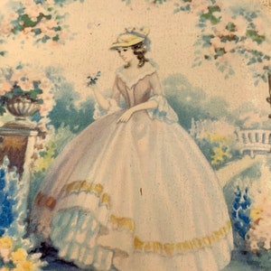 May include: A watercolor painting of a woman in a white dress with a yellow hat standing in a garden. The woman is holding a flower in her hand. The garden is filled with flowers and greenery.