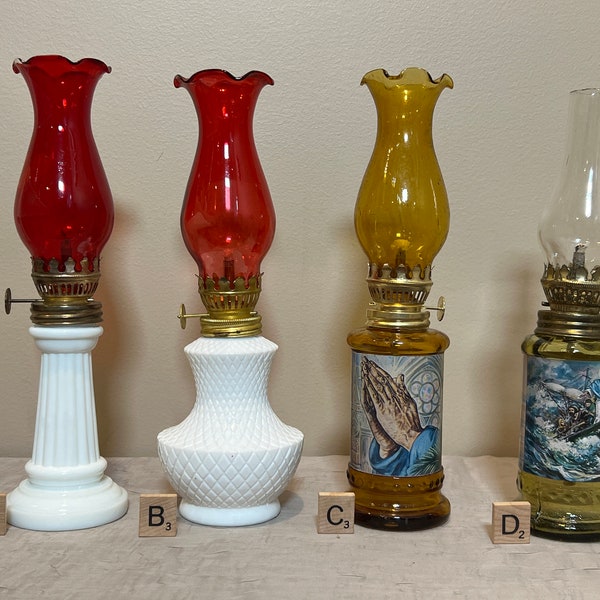 Miniature Oil Lamp | Choose From: Milk Glass Pillar w/Red Shade, Milk Glass Diamond w/Red Shade, Amber Praying Hands, Or Amber Calm The Seas