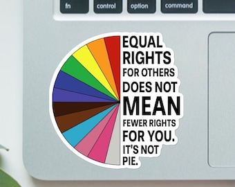 May include: A circular sticker featuring a rainbow pie chart and the text: "EQUAL RIGHTS FOR OTHERS DOES NOT MEAN FEWER RIGHTS FOR YOU. IT'S NOT PIE." The sticker is placed on a laptop.