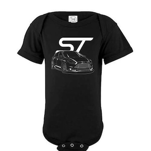 May include: Black baby grow with a white outline of a Ford Focus ST car and the letters "ST" above it.