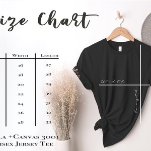 May include: Size chart for a unisex jersey tee shirt, showing width and length measurements in inches for sizes XS to 3XL. The chart is printed on a white background with black text.