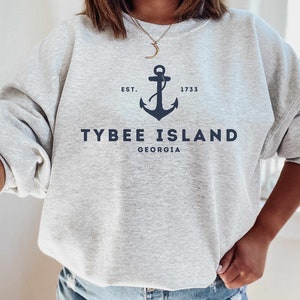 May include: Gray sweatshirt with a navy blue anchor and the text "EST. 1733 TYBEE ISLAND GEORGIA"