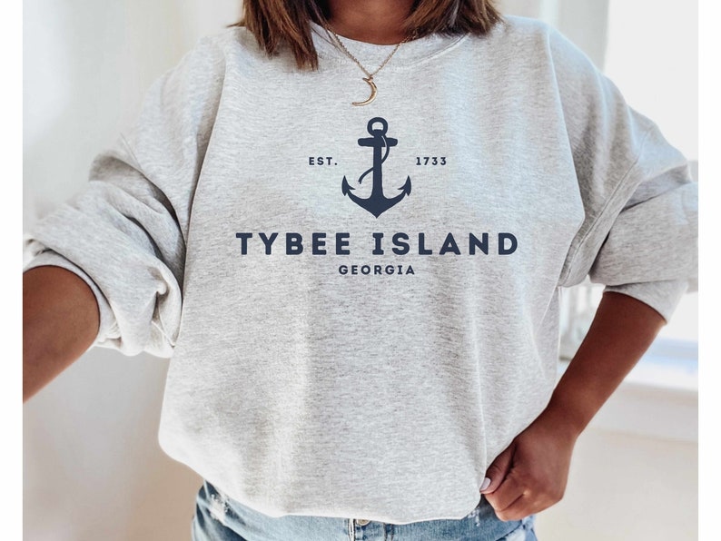 May include: Gray sweatshirt with a navy blue anchor and the text "EST. 1733 TYBEE ISLAND GEORGIA"