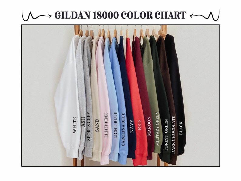 May include: A color chart of Gildan 18000 sweatshirts in various colors, including white, ash, sports grey, sand, light pink, light blue, Carolina blue, navy, red, maroon, military green, forest green, dark chocolate, and black. The text "GILDAN 18000 COLOR CHART" is at the top.