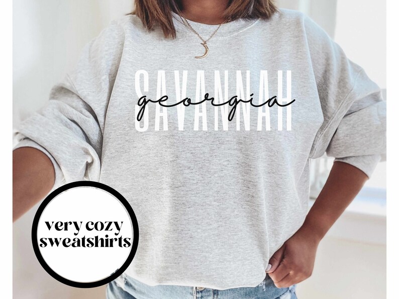 May include: A gray sweatshirt with the text "SAVANNAH georgia" in white and black lettering.