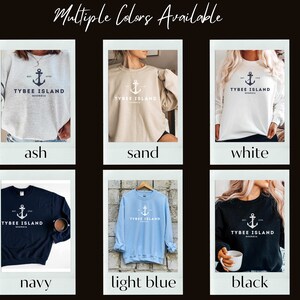 May include: A collage of photos showing a sweatshirt with the text "TYBEE ISLAND" and an anchor graphic in various colors, including ash, sand, white, navy, light blue, and black.