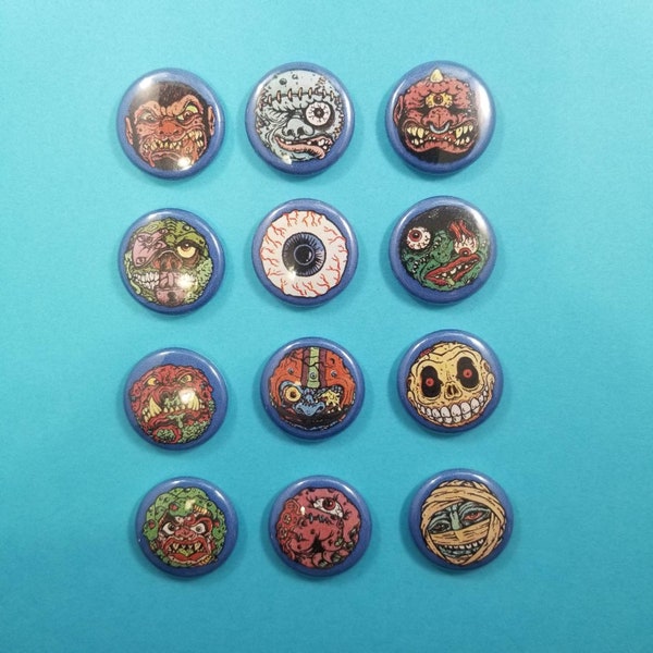 Madballs! Set of 12 pin back buttons featuring the original madballs. Pins badges 80s toys