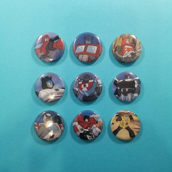 Robots in disguise! Set of 9 Transformers refrigerator magnets featuring Autobots from the 80s cartoon. Vintage toys retro one inch magnets