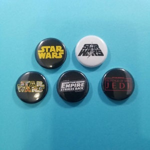 Star wars buttons! Set of 5 pinback buttons badges pins featuring different Star Wars logos. Empire Strikes Back, Return of the Jedi! pin