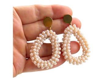 Statement earrings made of cut glass beads
