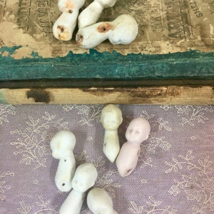 T#16 -  Vintage German Small bisque &quot;baby&quot; torsos, 1 1/2&quot;, painted faces, frozen Charlotte.  Listing is for two (2) dolls for 14.00