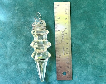 Tapón de cristal elaborado como adorno.