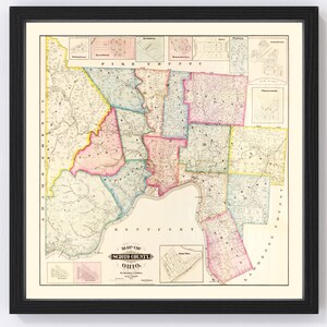 May include: An antique map of Scioto County, Ohio, printed in black, red, blue, yellow, and green ink. The map shows the county's townships and cities, including Portsmouth, Chillicothe, and Waverly. The map is framed in a black frame.