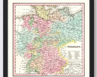 May include: A vintage map of Germany from 1850, showing the different states and provinces. The map is printed in black and white with colored borders for each state. The map is titled "Germany" and includes a key to the different states.