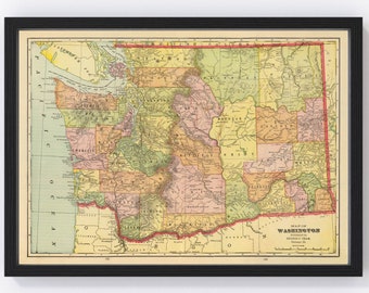 May include: Framed vintage map of Washington State, featuring a detailed depiction of counties and geographical features. The map is in a black frame and displays a color palette of yellows, greens, and pinks, with text indicating the state's name.
