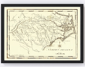 May include: An antique map of North Carolina and South Carolina, printed in black and white on a cream-coloured background. The map shows rivers, towns, and other geographical features. The title "NORTH CAROLINA" is printed in large, bold letters at the bottom of the map.