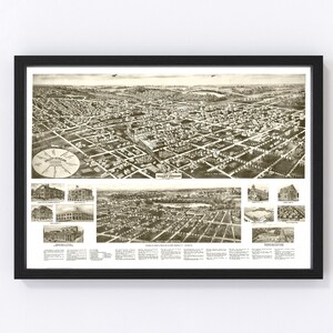 May include: A vintage aerial view map of Valley Stream, New York, printed in black and white. The map shows the layout of the town with streets, buildings, and parks. The map also includes a key with points of interest, such as the Valley Stream High School and the Valley Stream Library.
