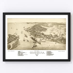 May include: An antique sepia-toned bird's eye view map of Cedar Key, Florida, dated 1889. The map shows the town's layout, including streets, buildings, and the surrounding water.