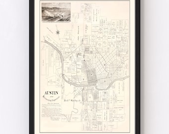 May include: A vintage map of Austin, Texas, showing the city's layout and surrounding properties. The map is printed in black and white and features a detailed street grid, with the Colorado River winding through the center. The map includes a small inset map of the city's dam.