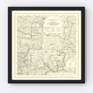 May include: A vintage map of the Columbia National Forest in Washington state. The map is printed in black and white on a cream-colored background. It shows the forest boundaries, roads, rivers, and other features. The map is dated 1912 and was published by the U.S. Department of Agriculture Forest Service.